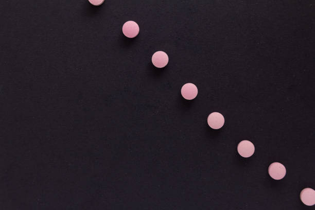 istock High Angle View Of Medicine Against Black Background 969671042