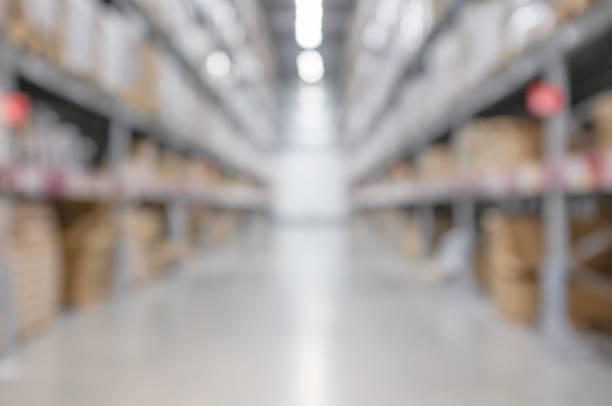 Blurred and defocused of modern warehouse for background usage.