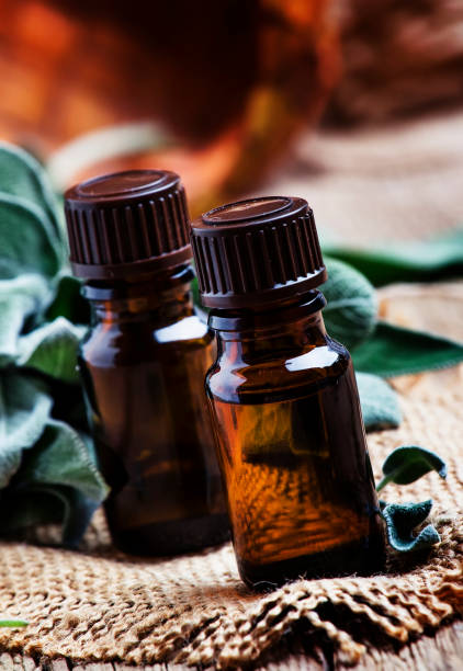 istock Essential sage oil in brown bottle 969672436