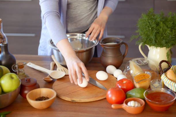 istock woman cooking in the kitchen( with dough) 969672654