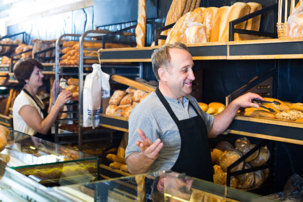 istock two bakers at the counter at bakery 969677406