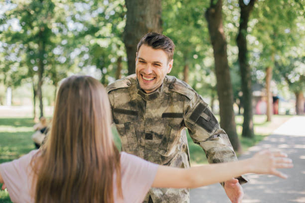 istock Soldier running towards his daughter 969680838