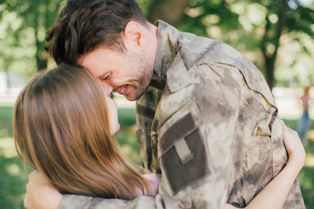 istock Emotional soldier with his daughter 969680884