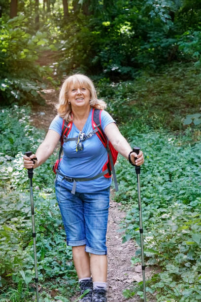 istock Senior woman hiking 969719676