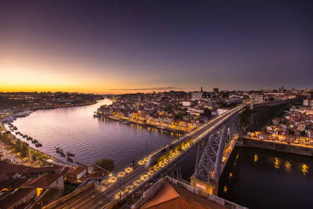 Photo of Tram Crossing from Porto to Vila Nova de Gaia at Dusk