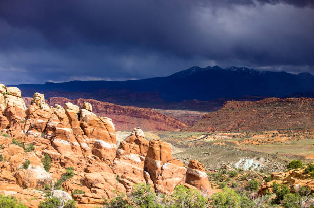 istock Fiery Furnace and Distant Mountains, Arches National Park 969719976