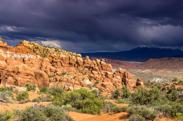 istock Fiery Furnace and Distant Mountains, Arches National Park 969719994