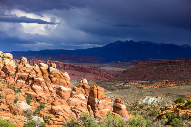 istock Fiery Furnace and Distant Mountains, Arches National Park 969719998