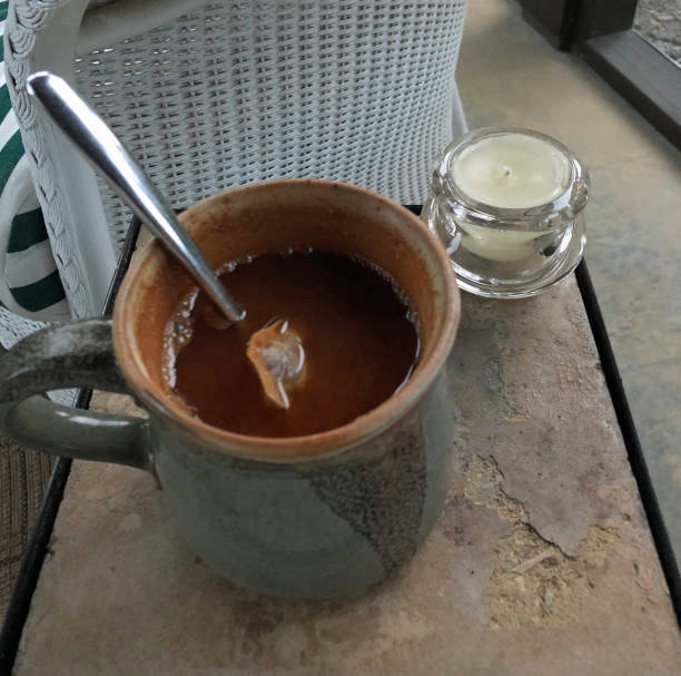 istock Cup of evening tea on the porch 969720302