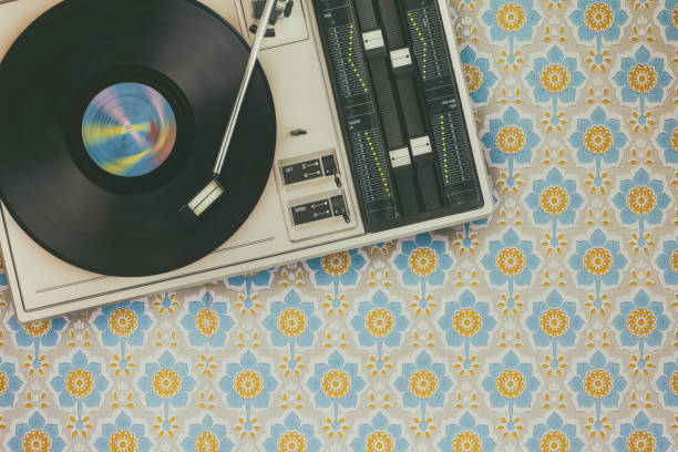 istock Record player on top of flower wallpaper 969737194