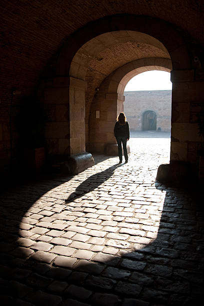 istock Woman standig under arch 96977390
