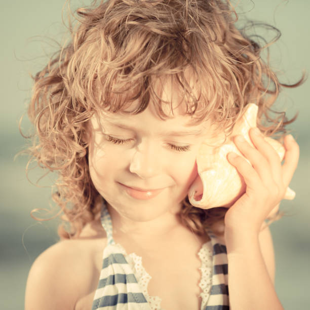 istock Happy child at the beach 969779756