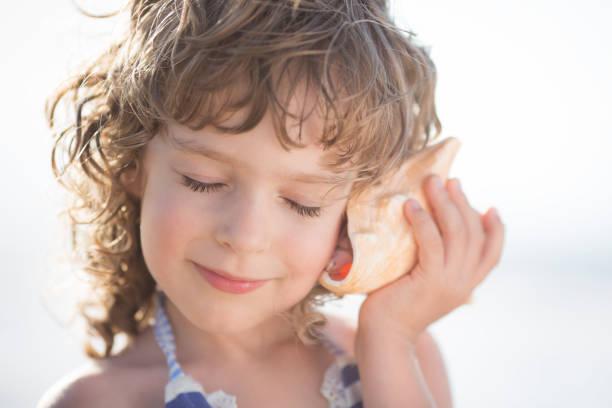 istock Child at the beach 969779774