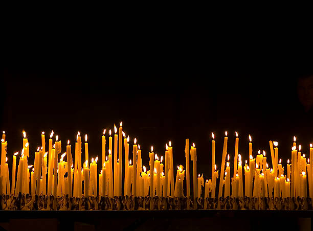 Large group of burning candles Background of burning candles in  a church. greek orthodox stock pictures, royalty-free photos & images