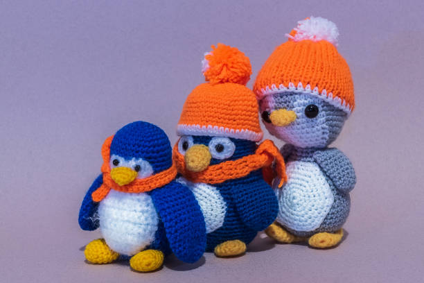 istock Homemade Three soft toy penguin. 969812598