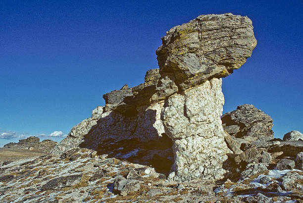 Rock Formations on the Continental Divide Trail Ridge Road crosses the Continental Divide of the Rocky Mountains. The summit of the famous road, at 12,183 feet above sea level, is the highest road in Colorado. This unusual rock formation is at the summit. Trail Ridge Road is in Rocky Mountain National Park, Colorado, USA. jeff goulden rocky mountain national park stock pictures, royalty-free photos & images