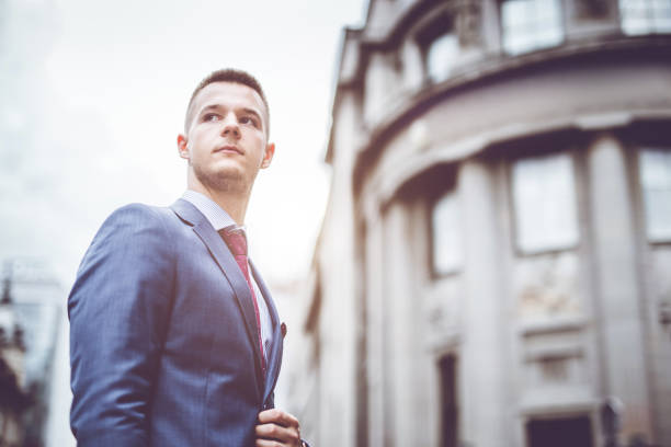 istock Businessman in front of a building 969834034
