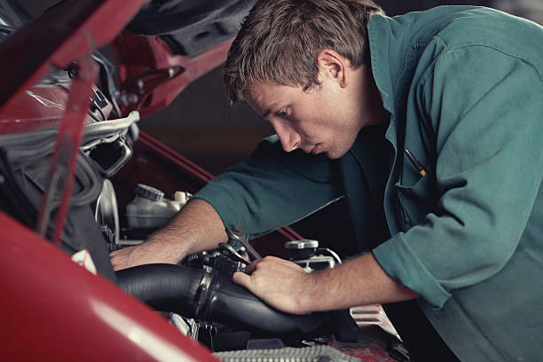 istock Mechanic fixing auto in car service 96983751