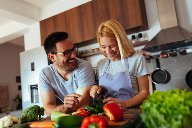 istock Young couple in love in the kitchen 969841372