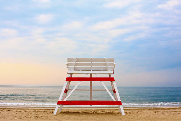 istock Lifeguard chair on an empty beach 96984342