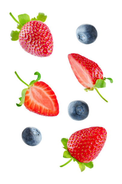 istock Fresh flying strawberries and blueberries 969844952