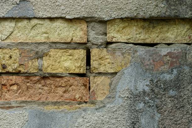 istock stone texture of concrete and bricks on the old wall 969845258
