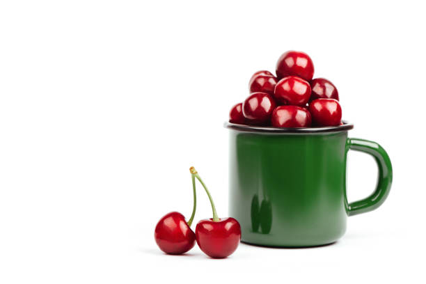 Cherries. Cherry. Cherries in green glass isolated. Fresh cherries. Cherry on white background. healthy food concept