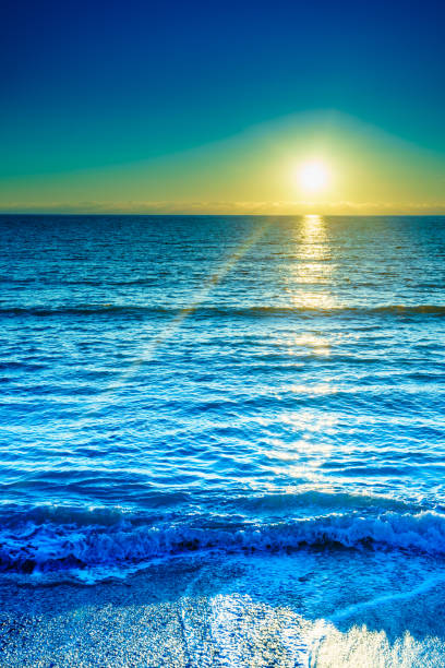 istock Sunset or sunrise over sea surface 969869302