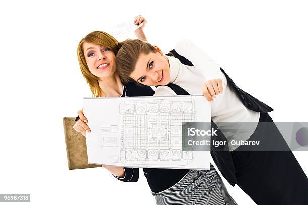 Foto de Feliz Businesswomen Com Blueprint e mais fotos de stock de Adolescente - Adolescente, Adolescentes Meninas, Adulto