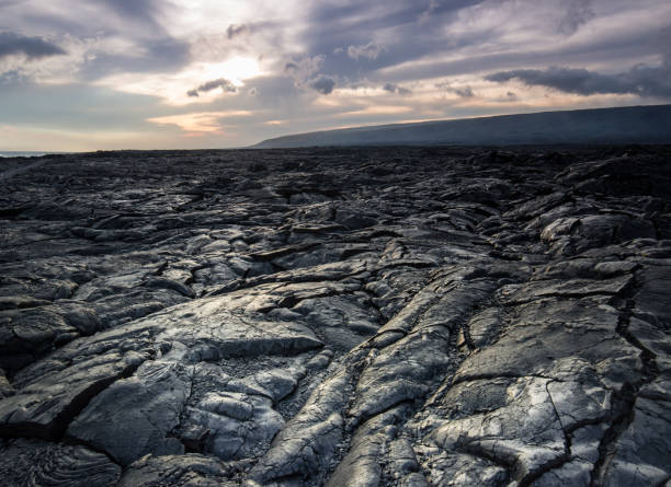 lava rock field in Hawaii Miles of lava rocks and hardened lava flow on the Big Island of Hawaii after a recent volcanic eruption extinct volcano stock pictures, royalty-free photos & images