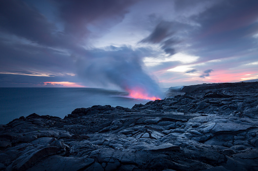 Sunset over a recent lava flow and volcanic eruption on the Big Island of Hawaii