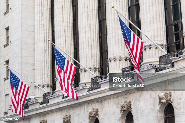 American Flags Waving On Exterior Of New York Stock Exchange Wall Street Lower Manhattan New York City Usa Stock Photo - Download Image Now