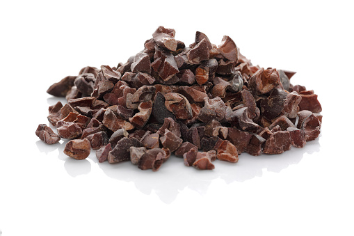 cacao nibs isolated on white background