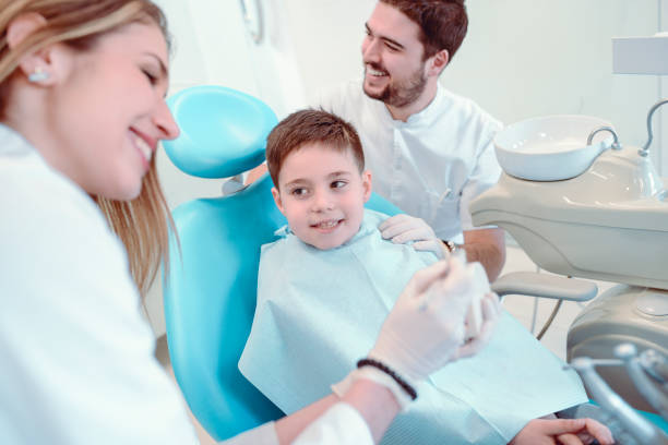 istock Dentist Checking Cute Boy's Dental Health 969906766