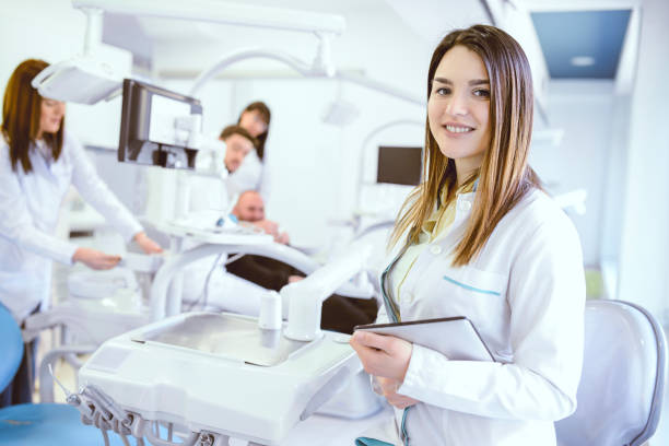istock Female Dentist Preparing For Patient Surgery 969906914