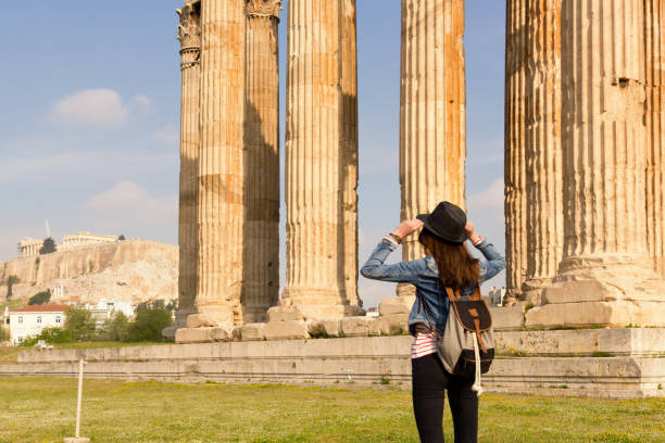 istock Young female traveler in back. 969909856