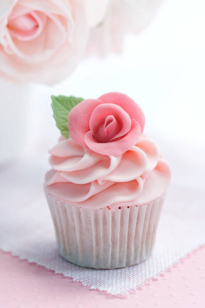 istock A beautiful cupcake topped with a pink rose 96991911