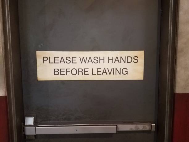 istock please wash hands before leaving sign on door 969946370