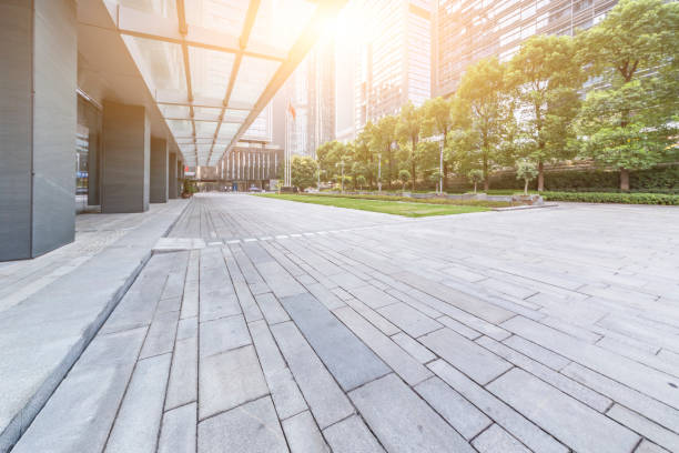 istock Panoramic skyline and modern business office buildings with empty road,empty concrete square floor 969949414