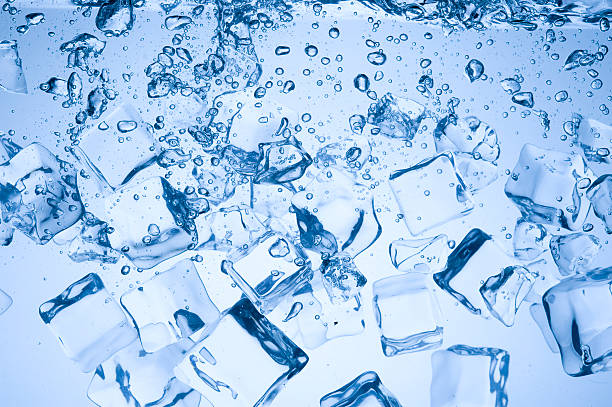 istock A bunch of blue ice floating in water 96995700