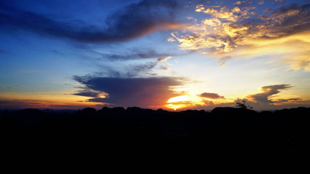 istock Sunrise and clouds over the mountain. 969957758