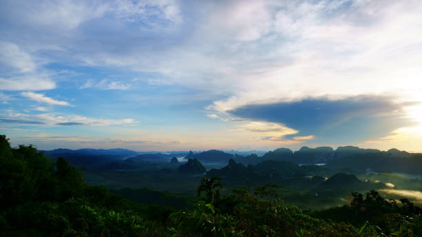 istock Sunrise and clouds over the mountain. 969957762