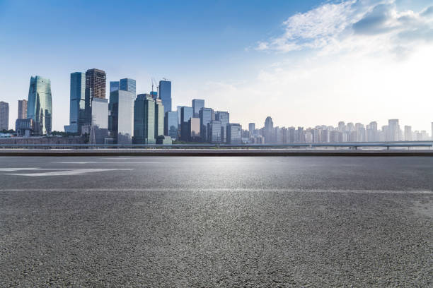 istock Panoramic skyline and modern business office buildings with empty road,empty concrete square floor 969957830