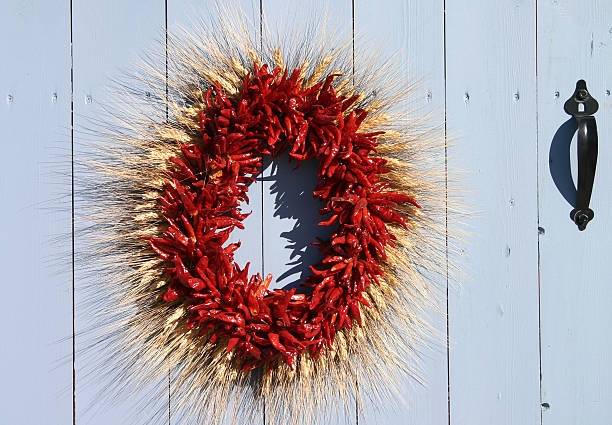 istock wreath of chilies on gate 96995790