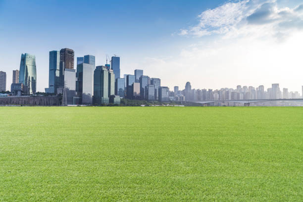 istock Panoramic skyline and modern business office buildings with empty road,empty concrete square floor 969957972