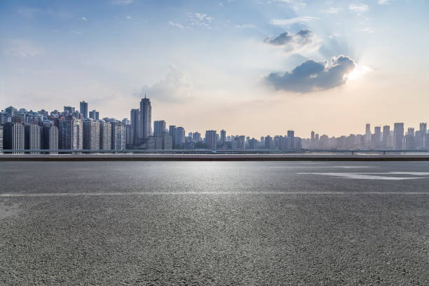 istock Panoramic skyline and modern business office buildings with empty road,empty concrete square floor 969957986