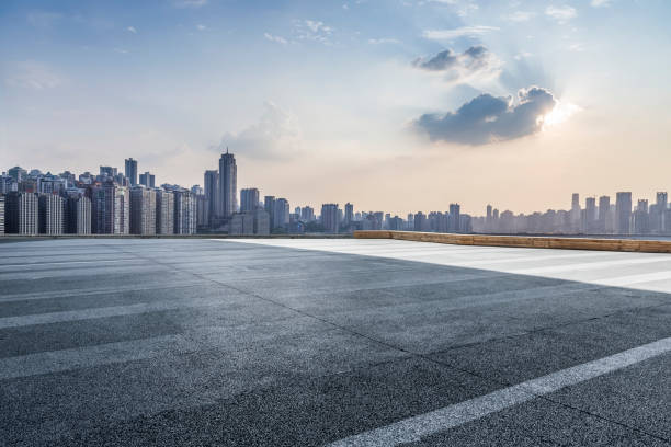 istock Panoramic skyline and modern business office buildings with empty road,empty concrete square floor 969958070