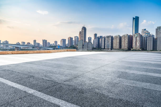 istock Panoramic skyline and modern business office buildings with empty road,empty concrete square floor 969958182