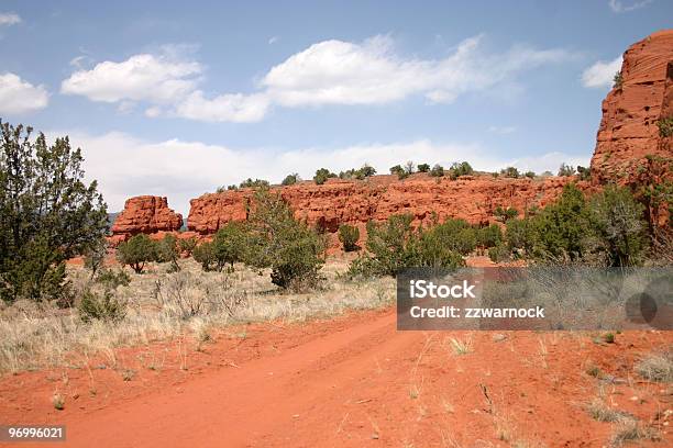 Road In Red Rock New Mexico Stock Photo - Download Image Now - Adobe - Material, Arid Climate, Barren