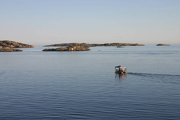 istock small boat on peaceful Swedish coastline 96996170